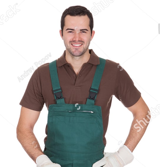 a man wearing a green apron and white gloves.