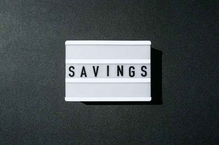 a white light switch with the words savings on it.
